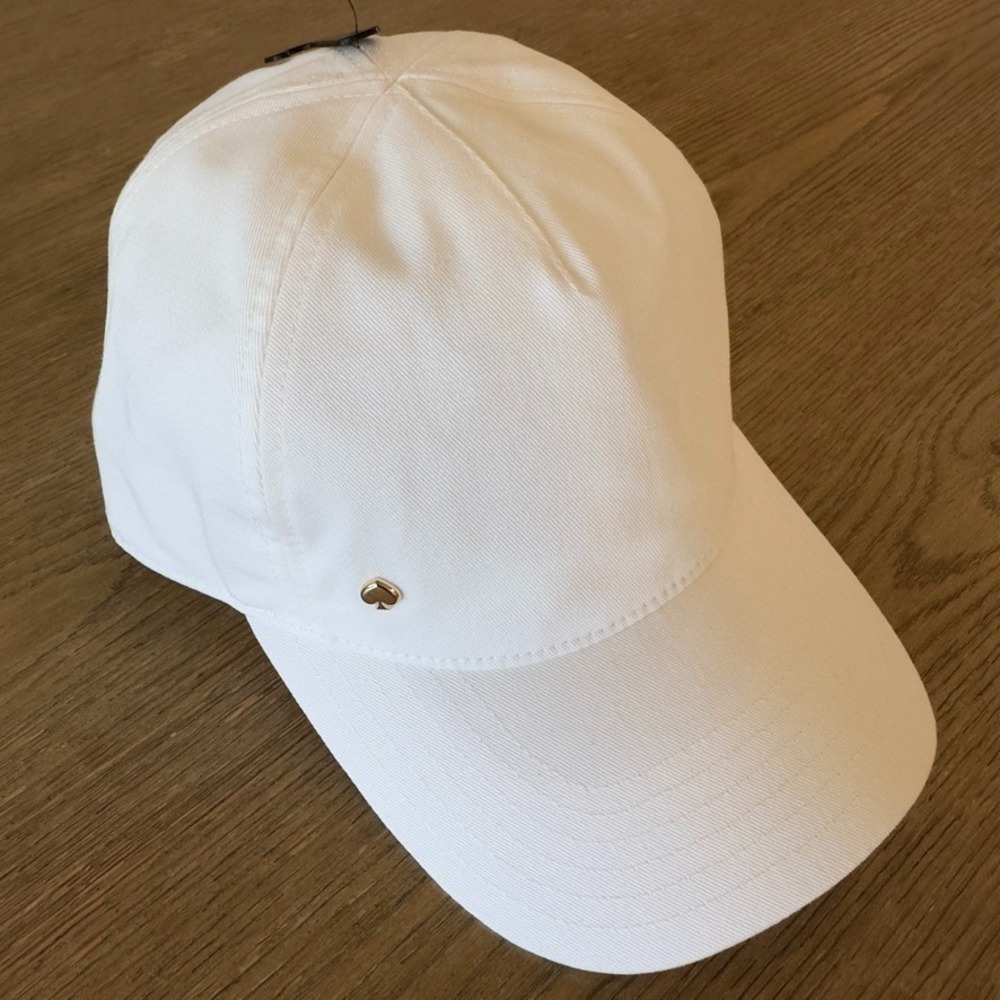 kate spade white baseball cap with gold logo